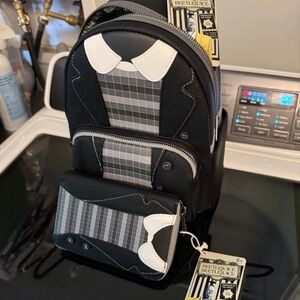 Hard tag Loungefly Beetlejuice Lydia backpack and wallet.